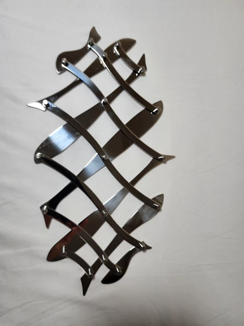 "Trivet extensible de acero inoxidable 18/10 Alessi ""Pescher"" Italia 2003