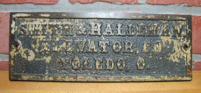 SMITH & HALDEMAN ELEVATOR CO TOLEDO O Orig Old Embossed Cast Iron Ad Sign Ohio