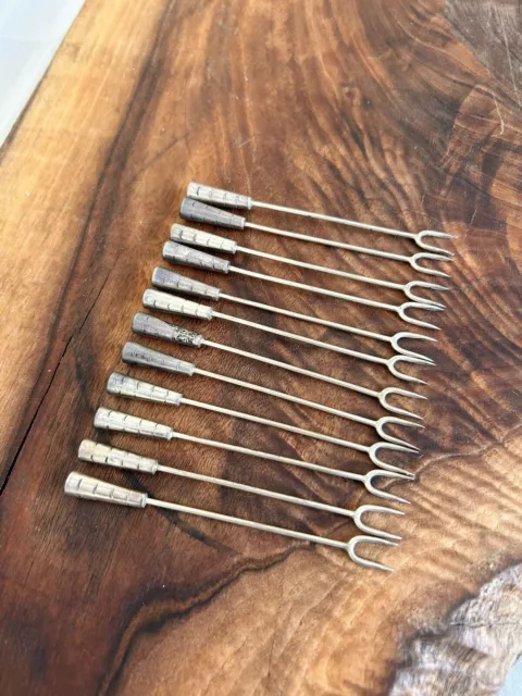 Sterling silver hors d’oeuvre picks, Set Of 12