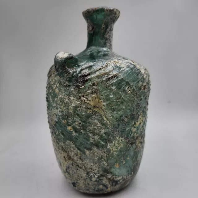 A Large Roman Glass Flask With Handles. Restored Piece. 2