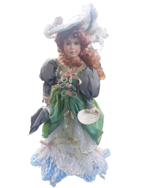 The Knightsbridge Collection Finely Detailed Porcelain Doll AMELIA.