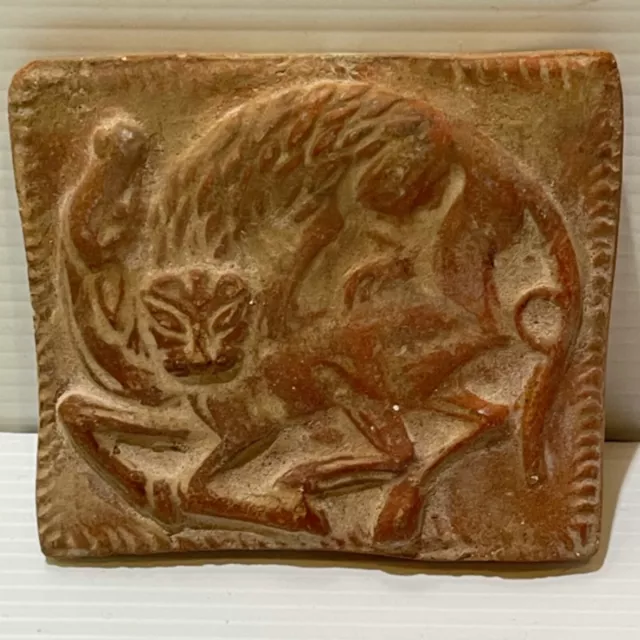ancient luristan ceramic plaque depicting the lion attacking a gazelle scarce