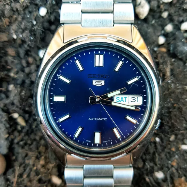 SEIKO 5 reloj automático de acero inoxidable con esfera azul SNXS77 para  hombre, Azul/esqueleto, Classic