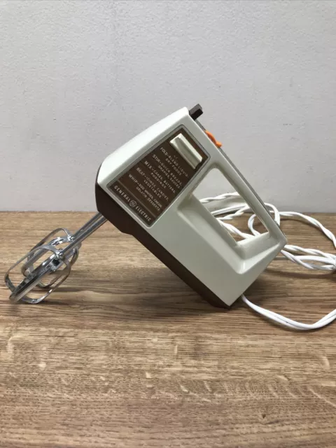 https://www.picclickimg.com/-1UAAOSwOX5hKcab/Vintage-GE-General-Electric-Deluxe-5-Speed-Portable.webp