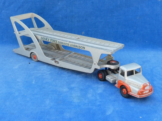 A group of Dinky Toys and Supertoys vehicles, including No. 514 Guy van