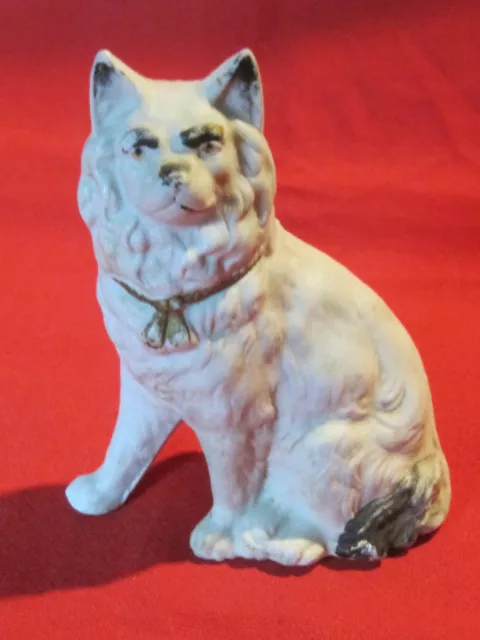 Vintage porcelain bisque Eskimo Samoyed Spitz dog figurine