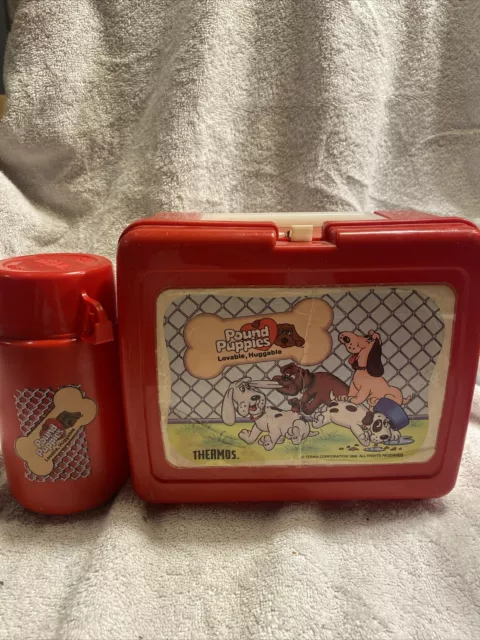 https://www.picclickimg.com/-2YAAOSwVOdlcSz0/Vintage-1986-Pound-Puppies-Red-Plastic-Thermos-Lunch.webp