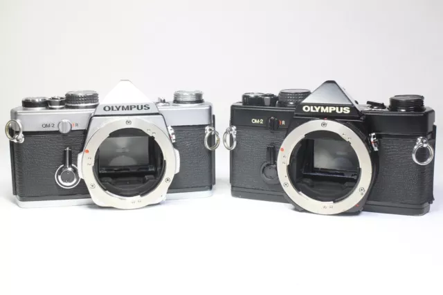 COMO ES Lote de 2 cámaras de película SLR Olympus OM-2 de 35 mm plateadas y...