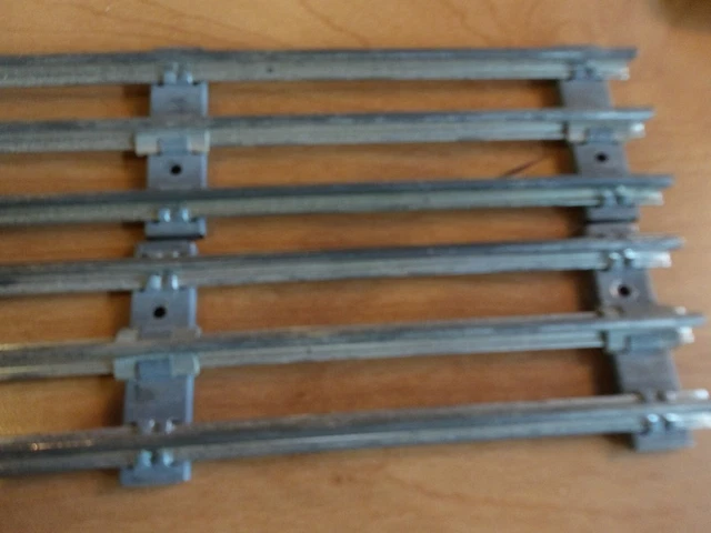 Lionel 027 track, 8 pieces, 9" straight, all pins, V good, USED, Silver ties,