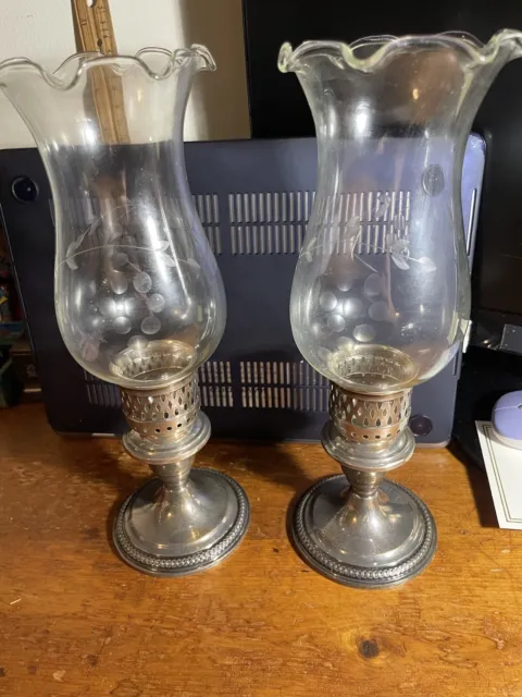 Set of two: 1960s Weighted Sterling Silver Hurricane Candlestick Holder + glass