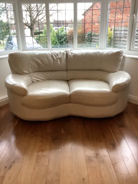 Leather Two Seater Curved Sofa Dfs