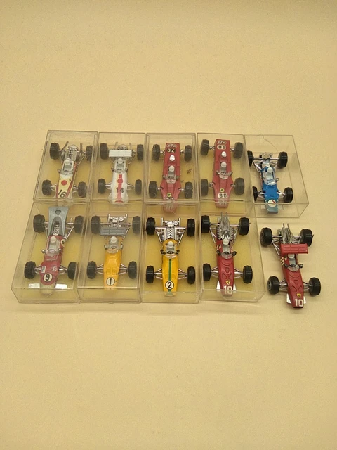 Lot 10 F1 miniature station service Elf Champion Ferrari Honda Lotus Matra McLar