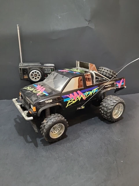 TYCO R/C 9.6V TURBO BANDIT NISSAN PICKUP TRUCK With Remote Tested **SEE VIDEO** TYCO R/C 9.6V TURBO BANDIT NISSAN PICKUP TRUCK With Remote Tested **SEE VIDEO**