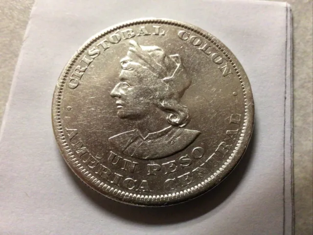 1894 El Salvador Un Peso KM115.1  Cristobal Colon Silver RARE RARE