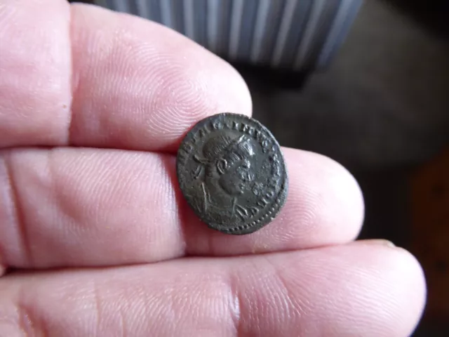 metal detecting find roman bronze coin.