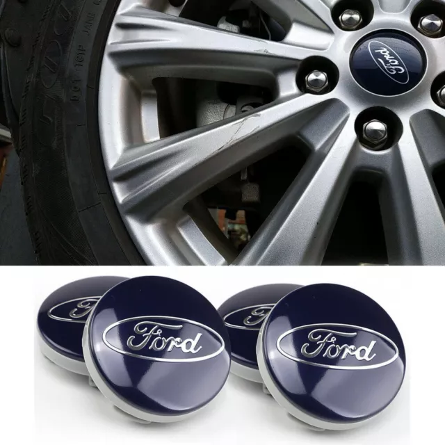 4x BLU FORD SI ADATTA ALLA MAGGIOR PARTE DEI MODELLI 54MM RUOTA IN LEGA TAPPI CENTRALI FOCUS FIESTA KA KUGA