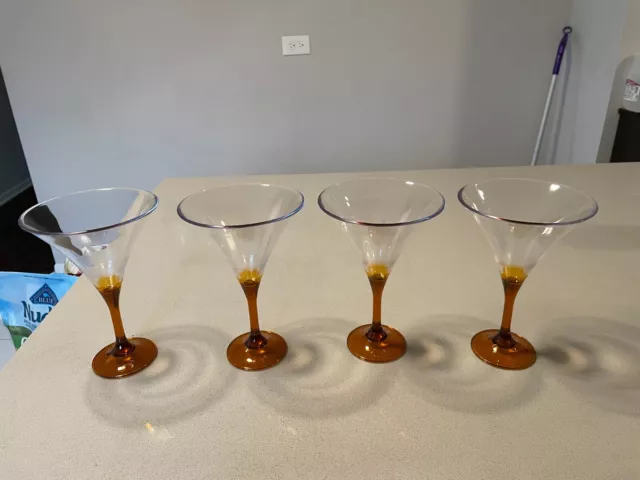 https://www.picclickimg.com/-8QAAOSwh6JkwwMi/Tupperware-sheerly-elegant-martini-glasses-orange-set-of.webp