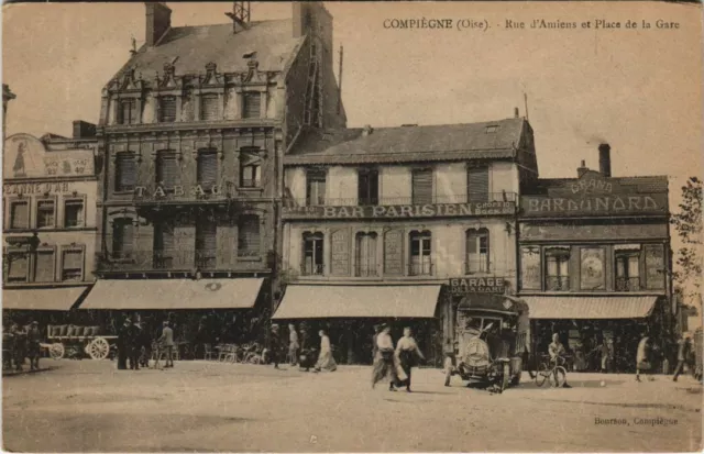 CPA COMPIEGNE Rue d'Amiens et Place de la Gare (1207786)