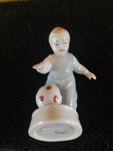 Zsolnay Pecs Hungary Porcelain figurine Baby Boy Playing Socce VINTAGE and Rare Zsolnay Pecs Hungary Porcelain figurine Baby Boy Playing Socce VINTAGE and Rare