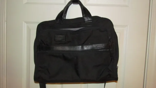 Tumi model 26108D2 black messenger bag. Pre-owned. Good shape.
