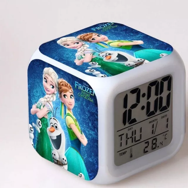 Frozen digital alarm clock, glowing LED, colour change, temperature 