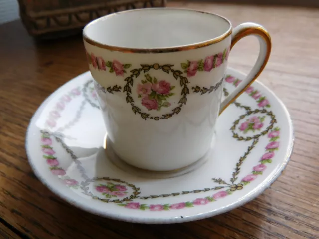 RAYNAUD Limoges tasse et sa soucoupe en porcelaine