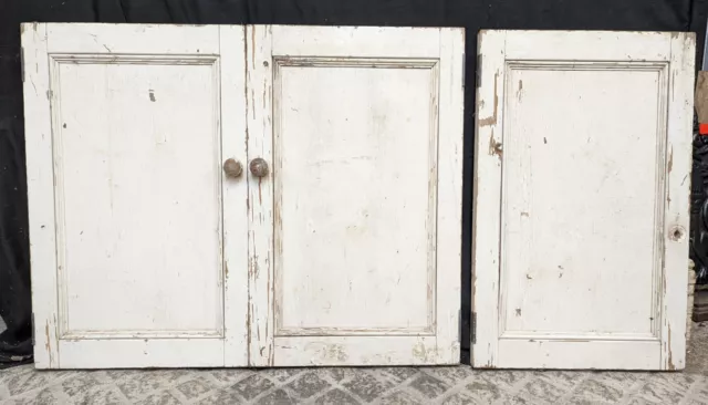 A SET OF THREE SMALL RECLAIMED PAINTED PINE CUPBOARD DOORS Ref CS0095