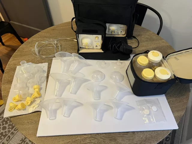 2 Medela Double Electric Breast Pumps with On the Go Tote + Several Accessories!
