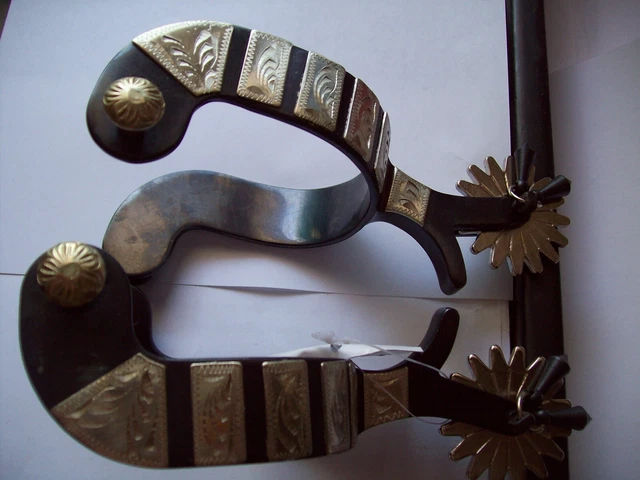 Black Steel Jingle Bob Spur with Engraved Silver Accents.