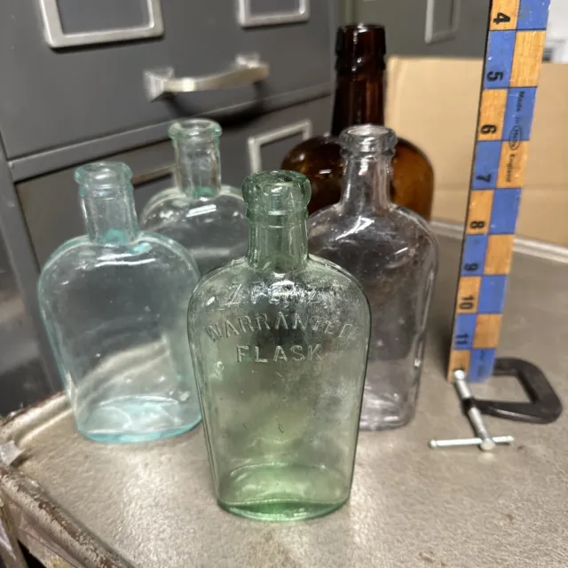Five Antique Whiskey Flask