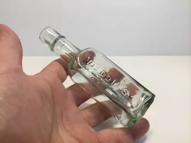 Small Antique Aqua Daddie's Sauce Bottle.