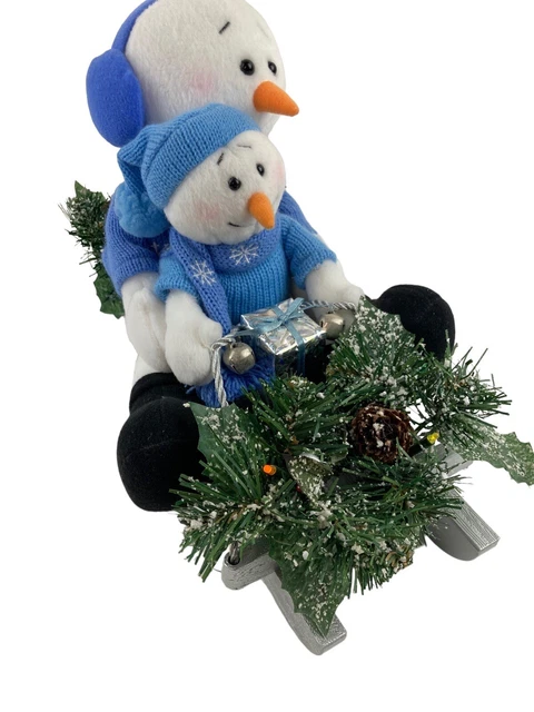 AVON A Magical Winter Sleigh Ride Snowman Christmas Musical Plush Figurine