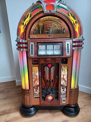 GAZELLE JUKEBOX EX CONDITION LIGHTS/BUBBLE FEATURE  GREAT INVESTMENT WITH CD'S 