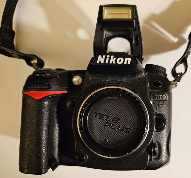 Nikon D7000 Digital SLR Camera with battery, battery charger and 32 GB card