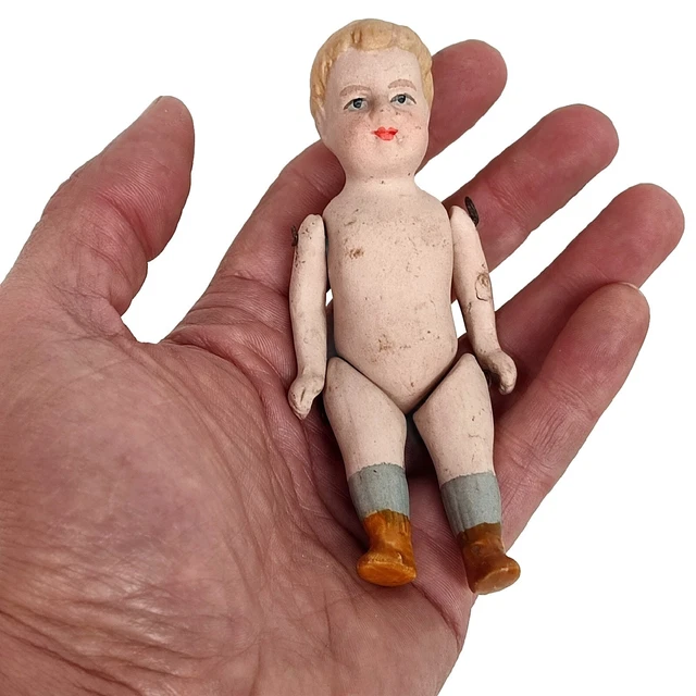 Poupée tête porcelaine SFBJ, moule 301 taille 0, yeux bleus dormeurs