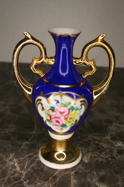 petit vase en porcelaine bleu et or décor floral Sèvres