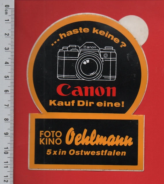 Publicité encadrée pour appareil photo argentique Canon EOS