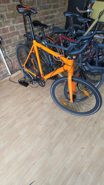 FLX BABYMAKER PRO in Orange Electric Bike 23 with Carbon Gates