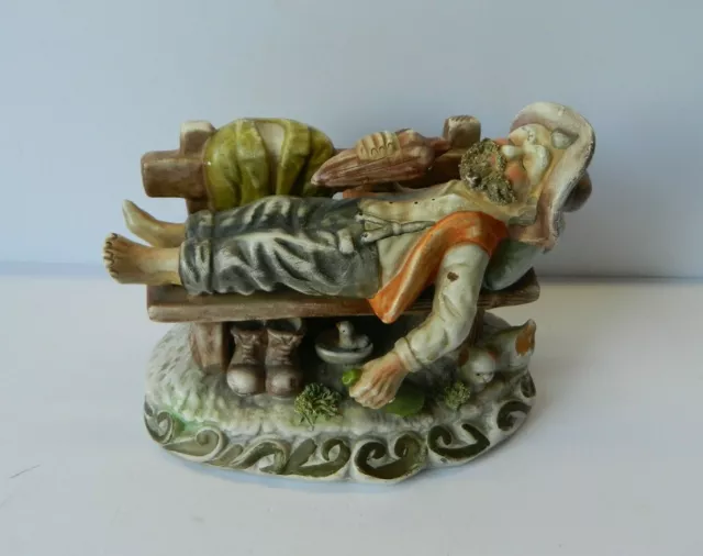 Vintage Ceramic Figure of a Tramp on a Bench
