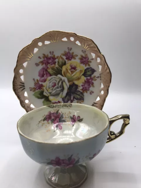 Taza de té y platillo de patas TIlso - rosa iridiscente floral con borde dorado