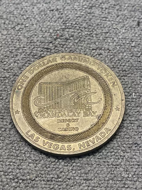 Vintage One Dollar Gaming Token Coin Mandalay Bay Resort Las Vegas NV KG
