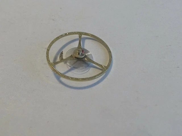 PIECE HORLOGERIE UN AXE DE BALANCIER POUR MONTRE AROGNO 10 1/2 151
