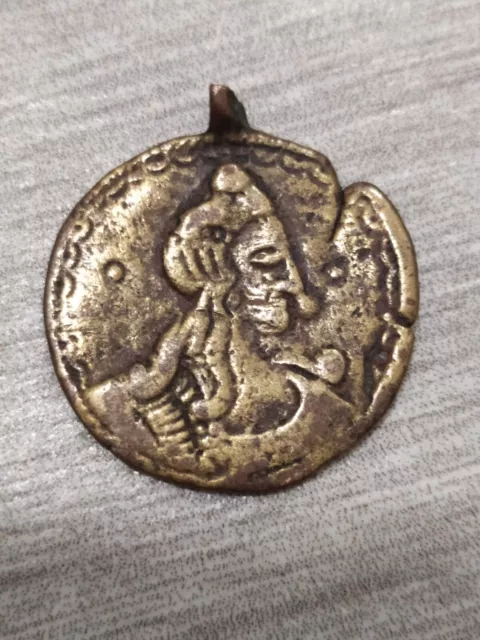 The pendant is ancient, 10-14 centuries. It was found with the help of a metal d