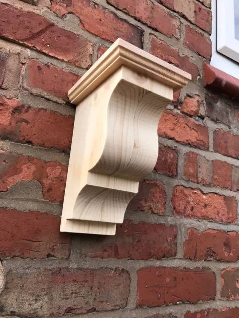 a pair of  extra large pine wood Corbel