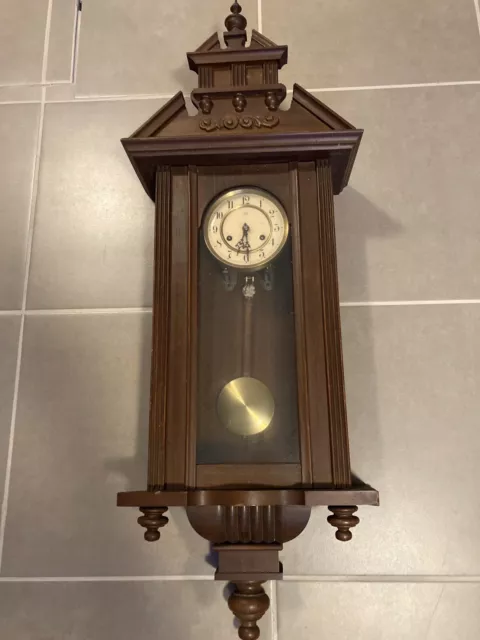 orologio a pendolo da parete in legno