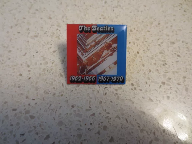 The Beatles Pin Commemorating the 1962-1966 Red album and 1967-1970 Blue album