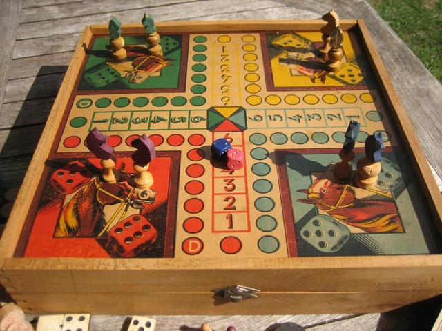 ANCIEN JEUX D'OSSELETS en os et plastique vendu avec leur pochette en