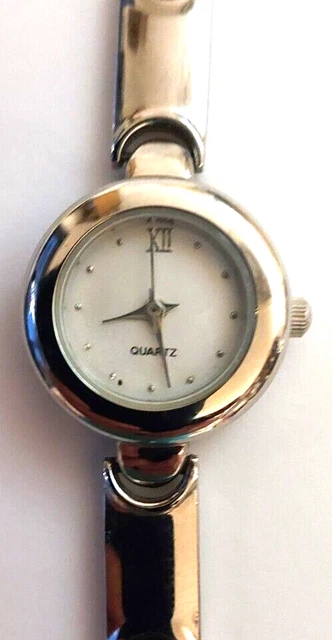 Montre Femme Marionnaud Quartz - Bracelet Rigide Transparent - Boîtier Argenté 34mm - Occasion