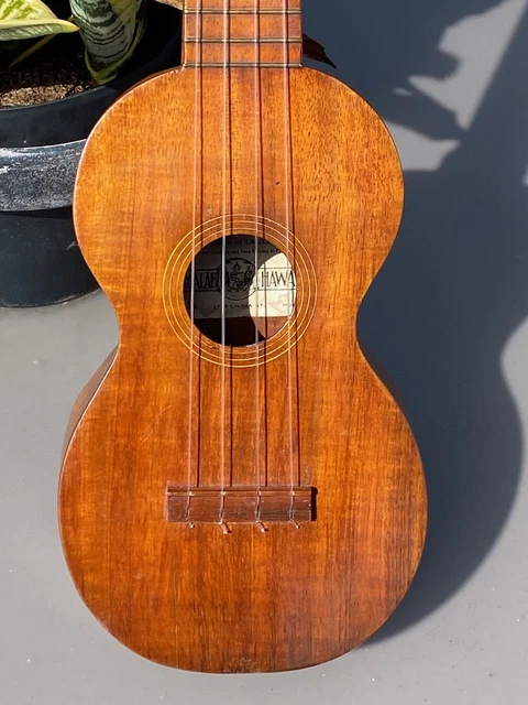 1920 Kumalae Ukulele all Koa wood all over 100 year old w/its original case. 1920 Kumalae Ukulele all Koa wood all over 100 year old w/its original case.