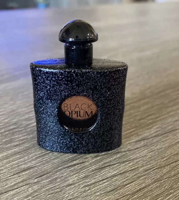 BLACK OPIUM EAU DE PARFUM 0.25 oz by Yves Saint Laurent (Miniature Splash WOMAN) BLACK OPIUM EAU DE PARFUM 0.25 oz by Yves Saint Laurent (Miniature Splash WOMAN)